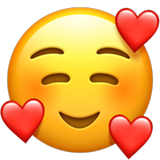 Uśmiechnięta buźka z sercami