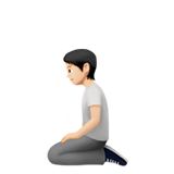 klęcząca osoba: karnacja jasna