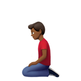 klęczący mężczyzna: karnacja średnio ciemna