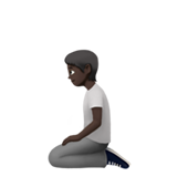 klęcząca osoba: karnacja ciemna