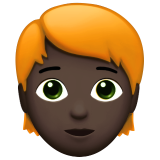 dorosły: karnacja ciemna i rude włosy